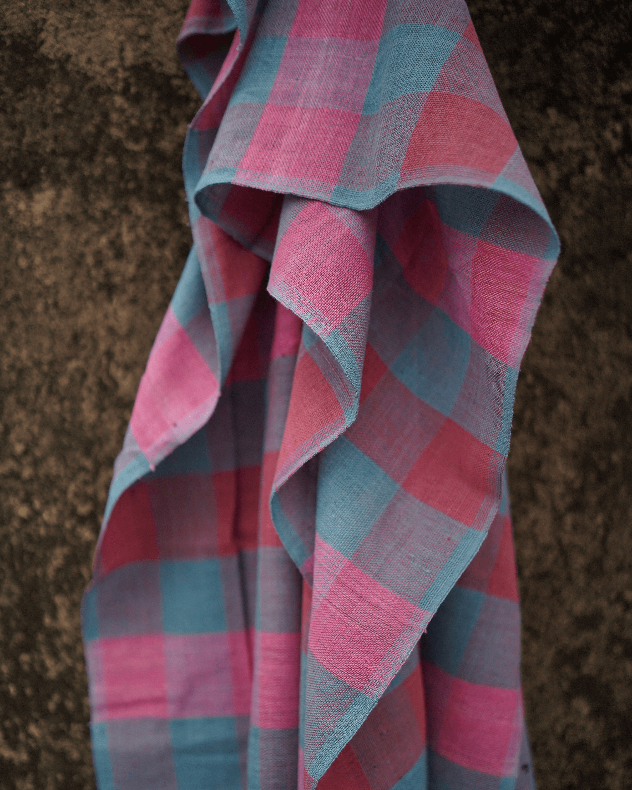 33-count handspun cotton stole in pink and blue checks, showcasing natural dye craftsmanship from West Bengal.